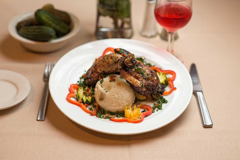 Chicken appetizer with hummus and red peppers