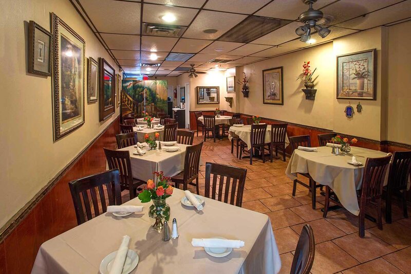 Dining room with multiple set tables