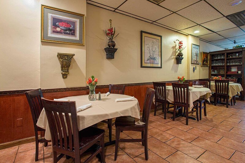 Dining room with two set tables