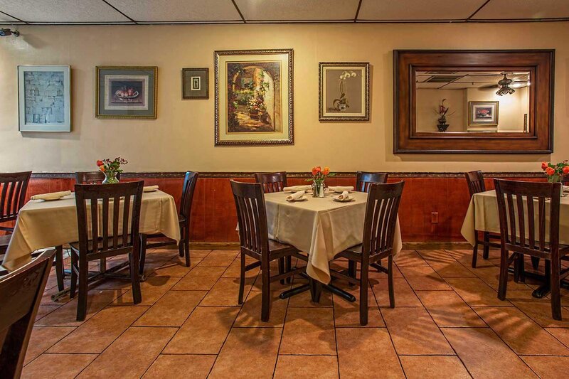 Dining room with three set tables